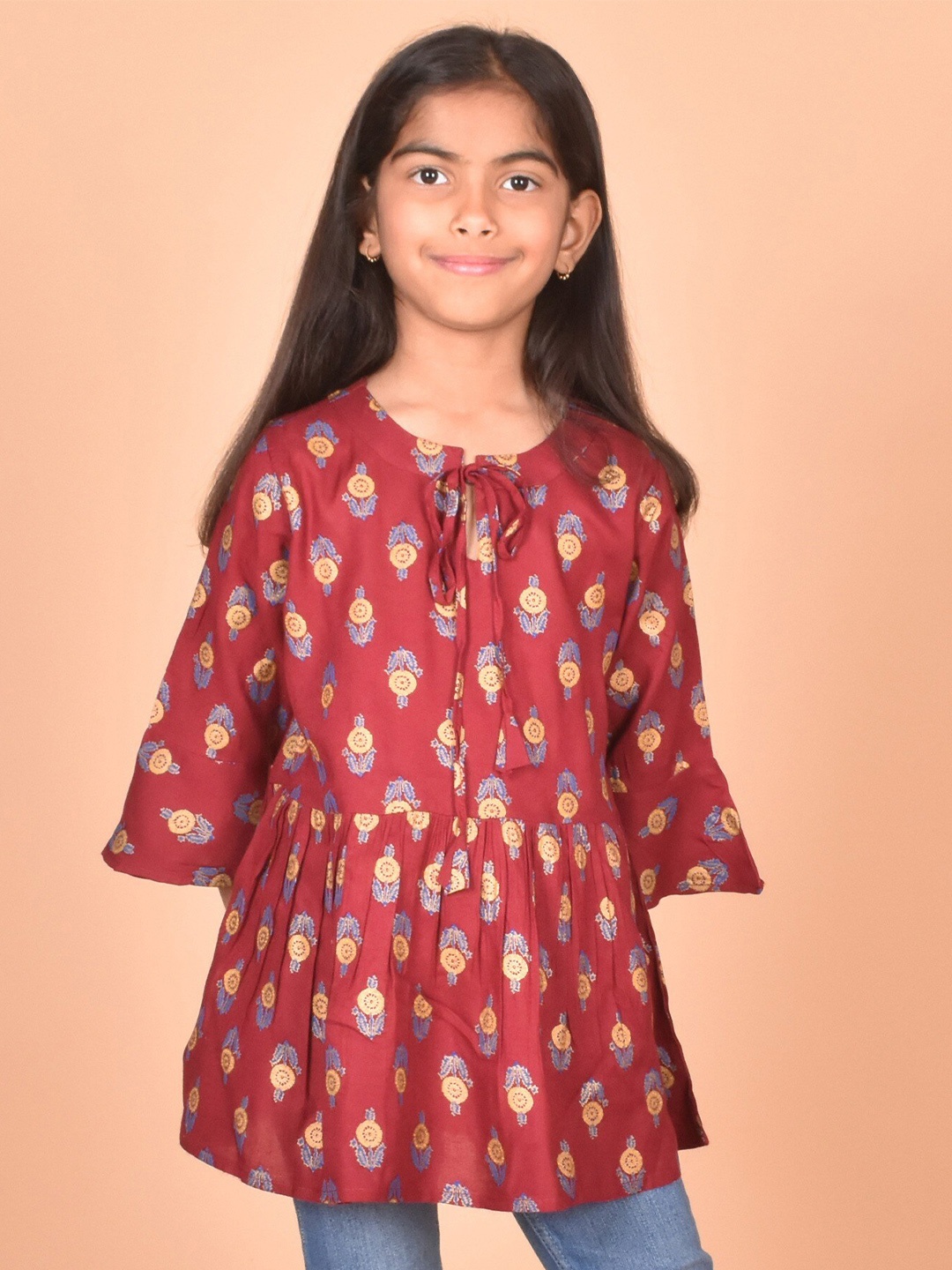 

misbis Girls Ethnic Motifs Printed Tie-Up Neck Bell Sleeve Top, Maroon