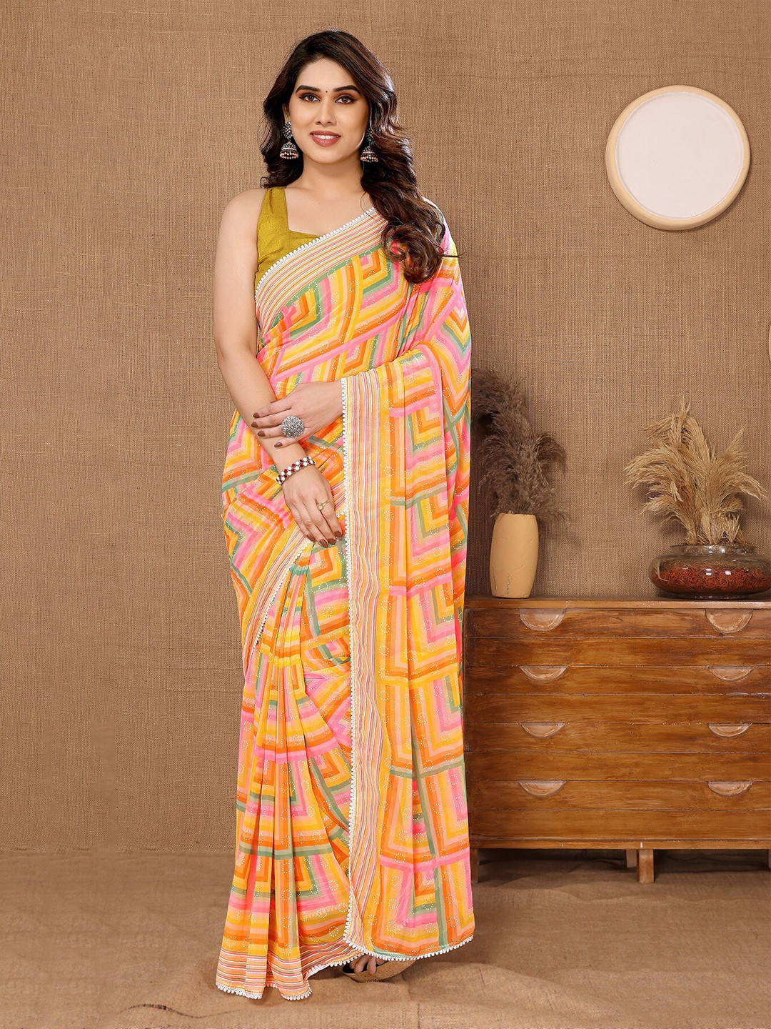 

BHARODIYA ENTERPRISES Geometric Printed Pure Georgette Ready to Wear Saree, Yellow