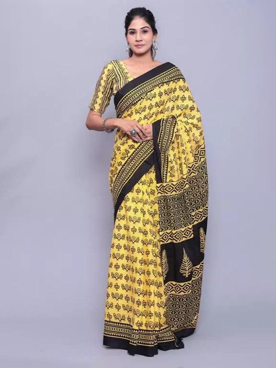 

TROPWEAR Floral Printed Block Print Saree, Yellow