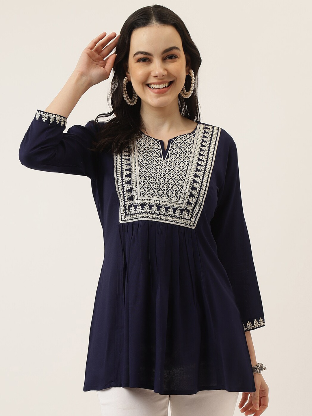 

Mandvi Ethnic Motifs Embroidered Peplum Top, Navy blue