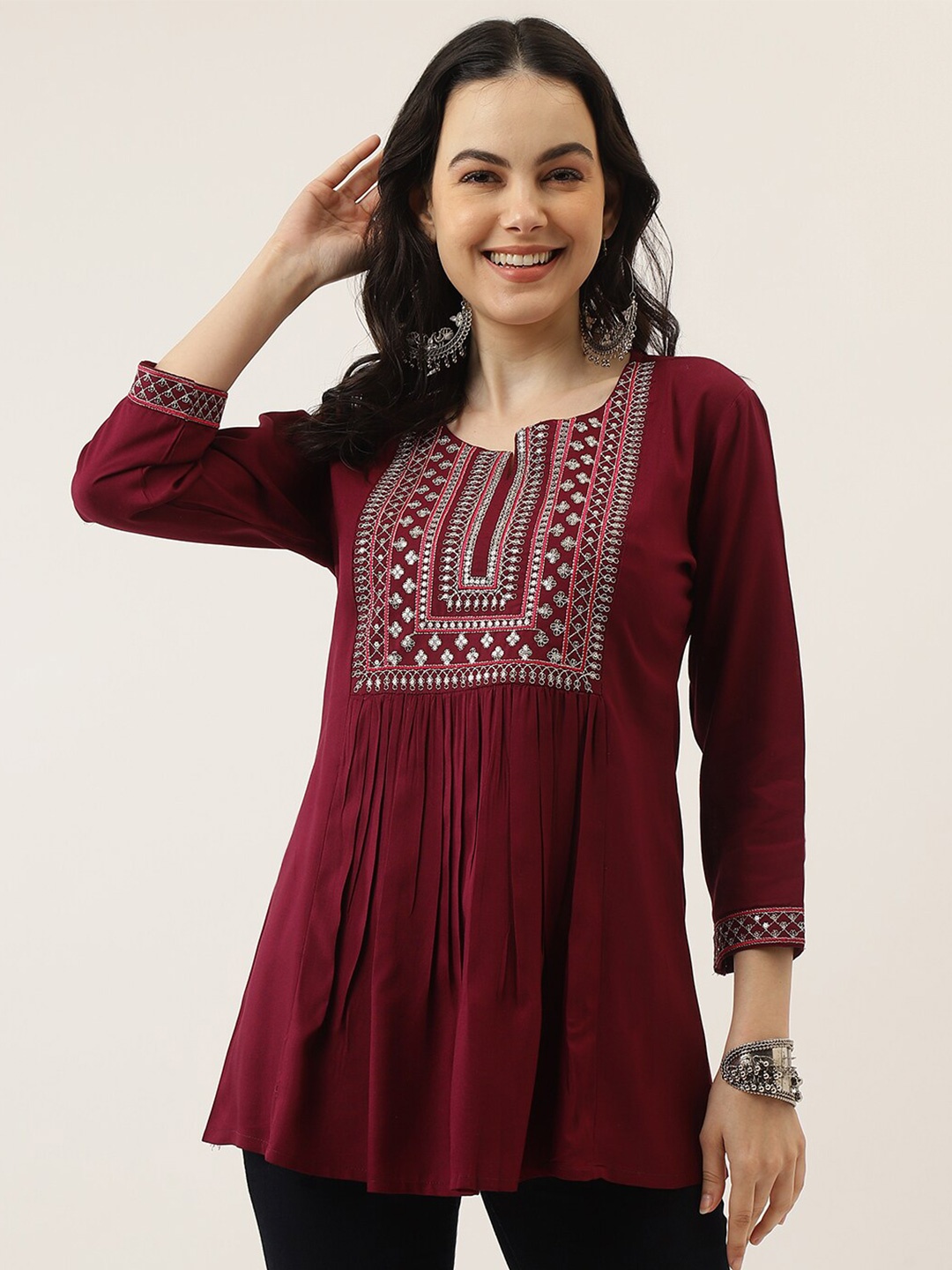 

Mandvi Ethnic Motifs Embroidered A-Line Top, Maroon