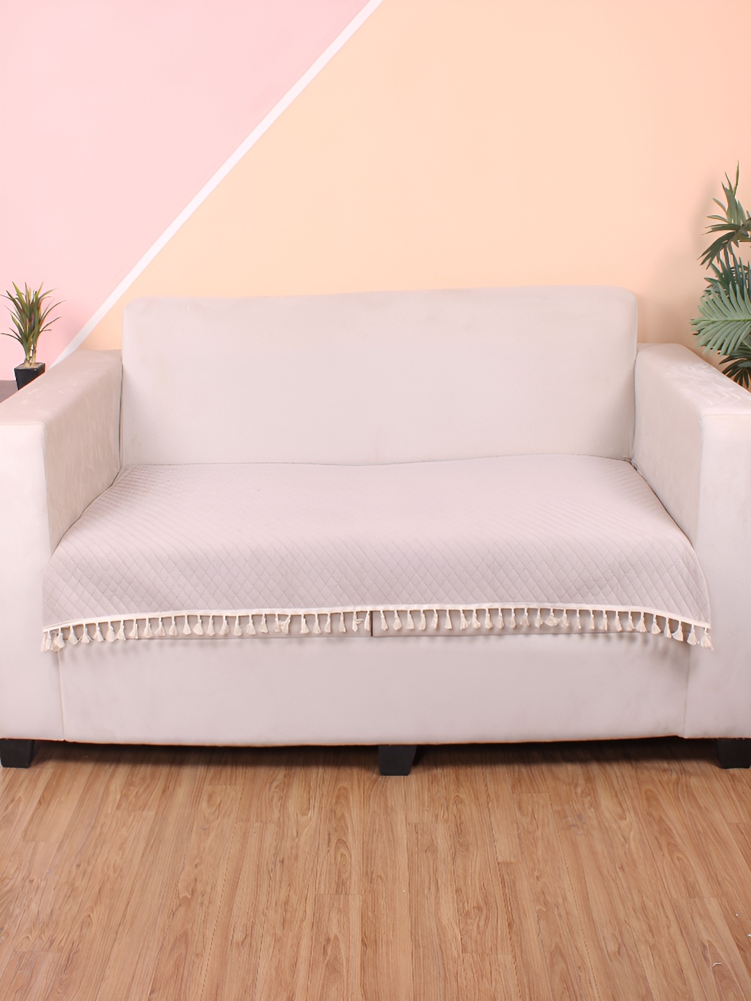 

STITCHNEST Beige Self Design 2 Seater Sofa Cover