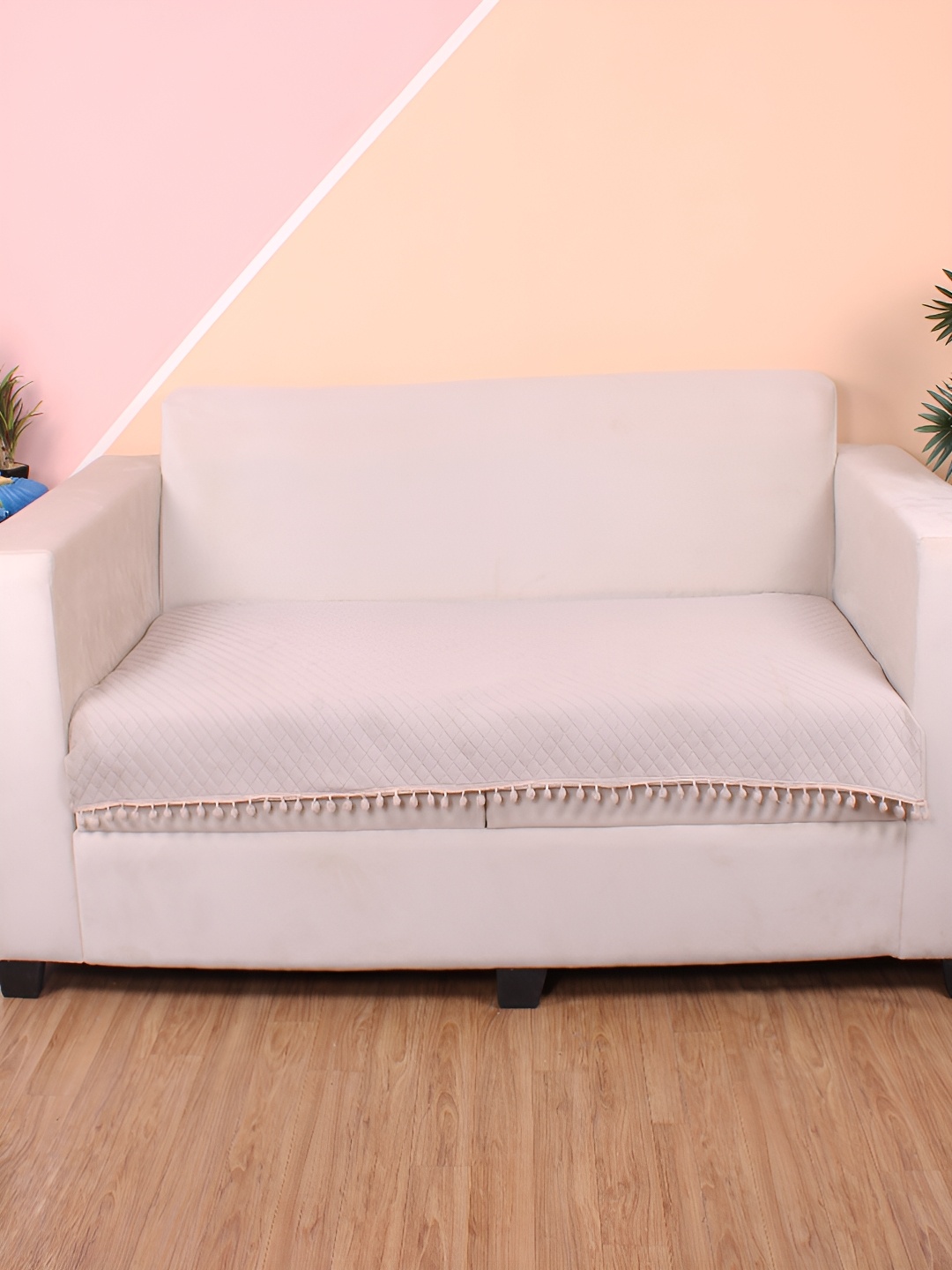 

STITCHNEST Beige Self Design 2 Seater Sofa Cover