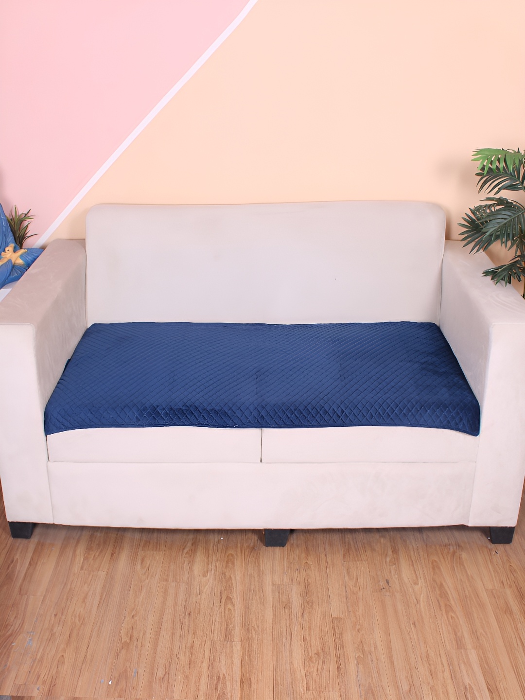 

STITCHNEST Blue Self Design 1 Seater Sofa Cover