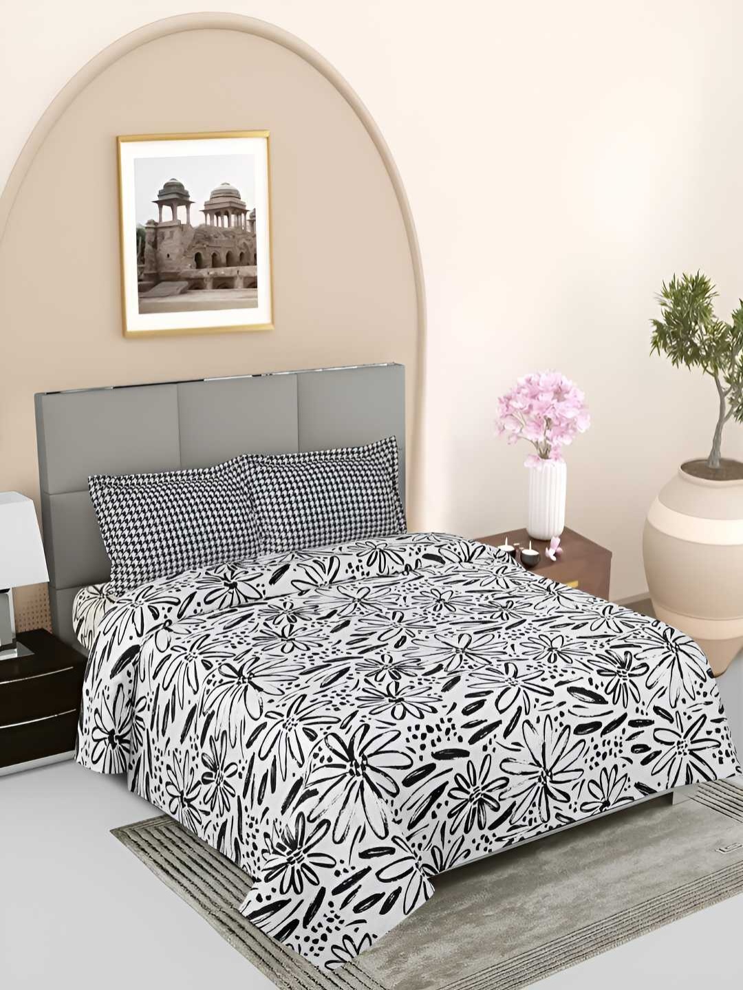 

GAPU & BALY White & Black Floral Printed 120 TC King Bedsheet With 2 Pillow Covers