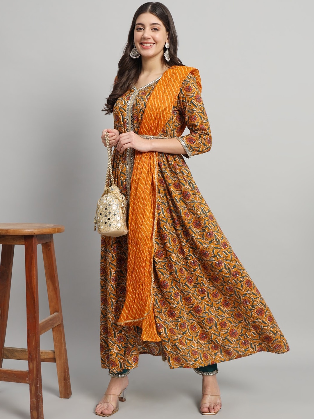 

Gujari Floral Printed Angrakha Mirror Work Kurta With Trousers & Duppatta, Orange