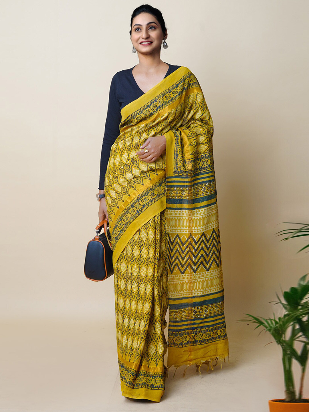 

Unnati Silks Ajrak Block Silk Blend Handloom Block Print Saree, Yellow