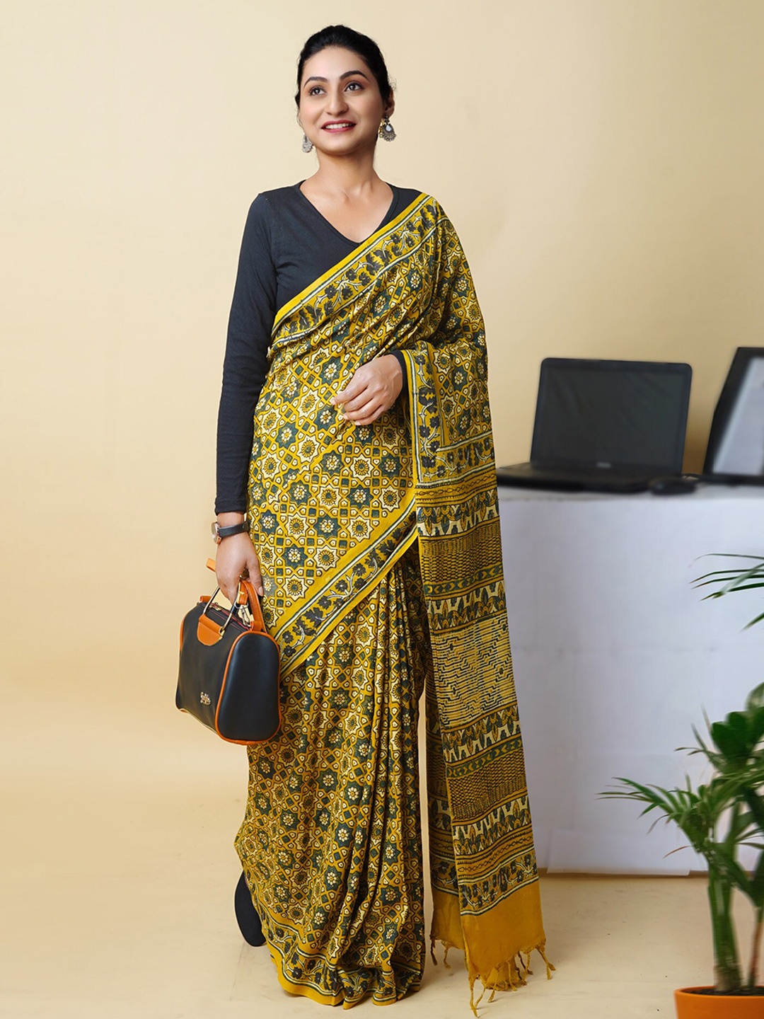 

Unnati Silks Ajrak Block Silk Blend Handloom Block Print Saree, Yellow