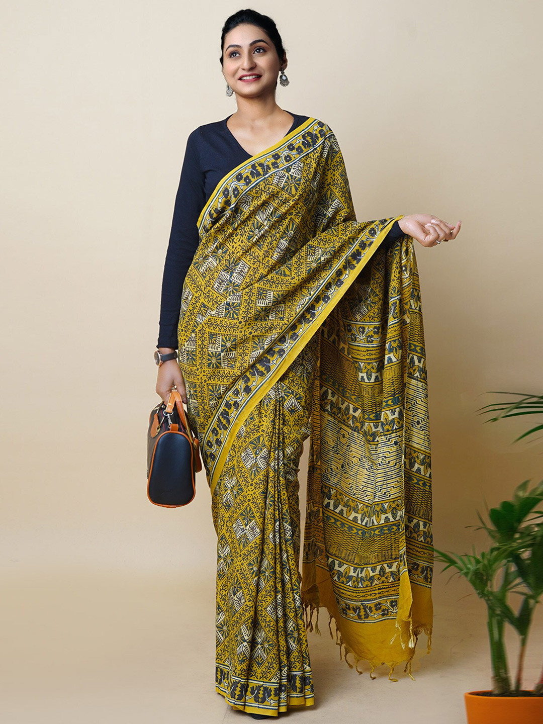 

Unnati Silks Ajrak Block Print Saree, Yellow