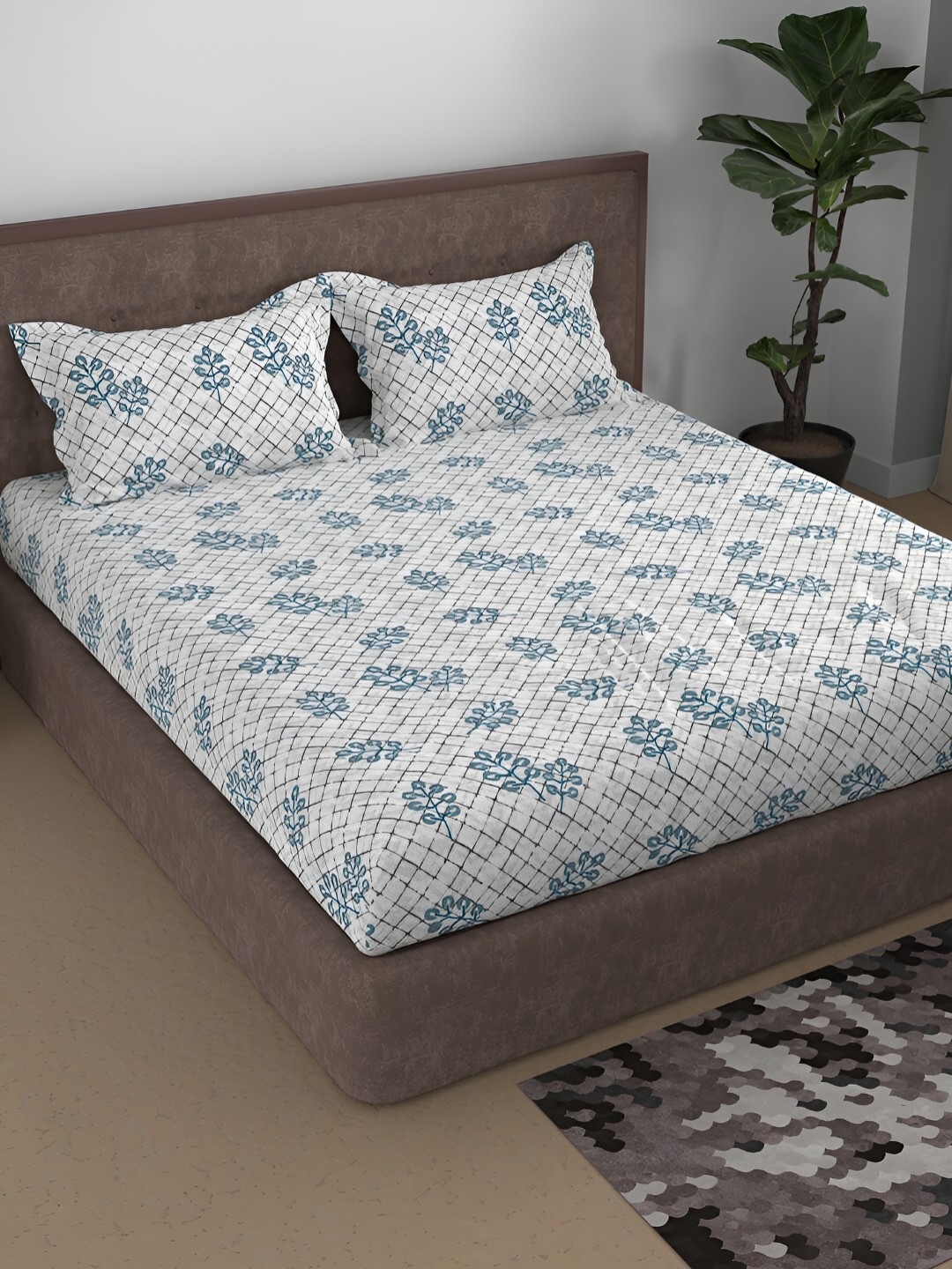 

Aura Blue & White Floral Printed Cotton 180 TC Queen Bedsheet With 2 Pillow Covers