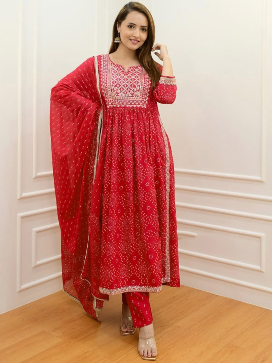 

OMASK Bandhani Printed Round Neck Three Quarter Sleeves Thread Work Kurta Set, Red