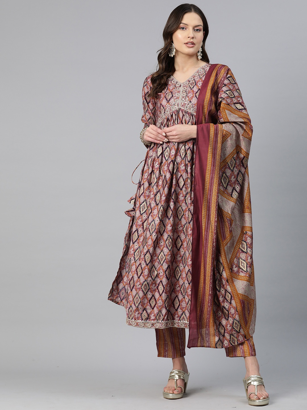 

Readiprint Fashions Ethnic Motifs Printed Empire Sequinned Chanderi Silk Kurta Set, Mustard