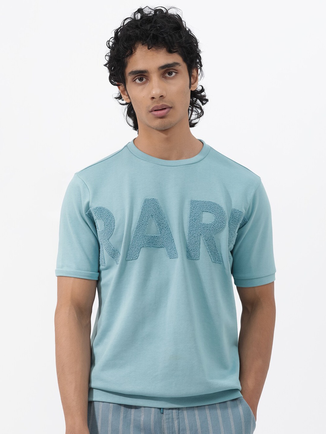 

RARE RABBIT Men Nor-2 Regular Fit Typography Printed Cotton T-Shirt, Turquoise blue