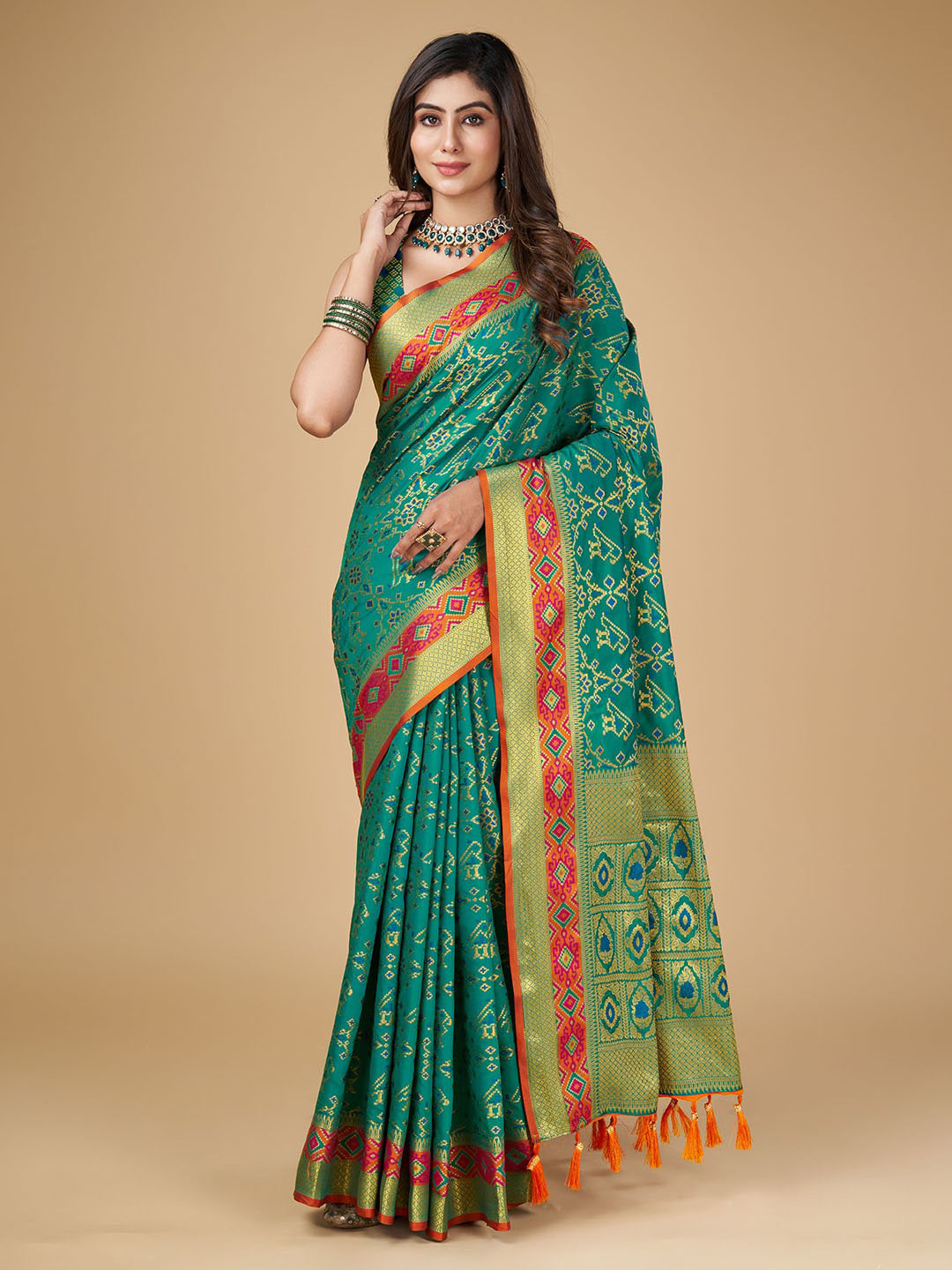 

RAJ DHARMA SILK Ethnic Motifs Woven Design Zari Patola Saree, Turquoise blue