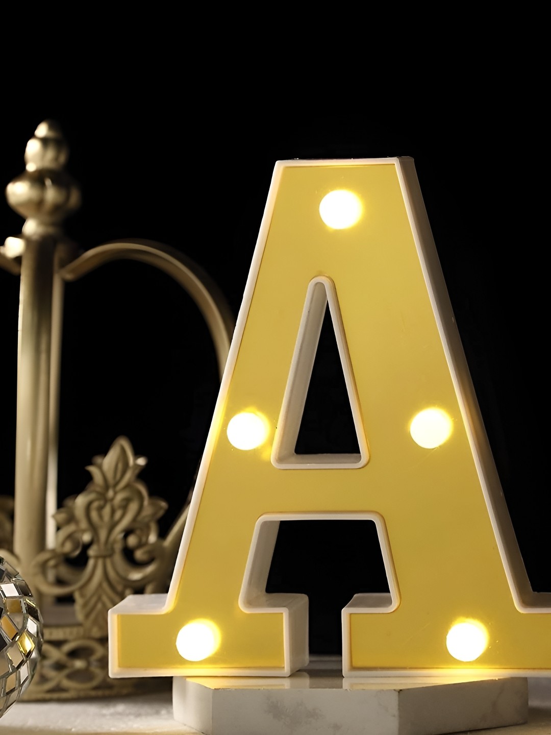 

Satyam Kraft Gold Toned & White Alphabet Shaped LED Table Lamp