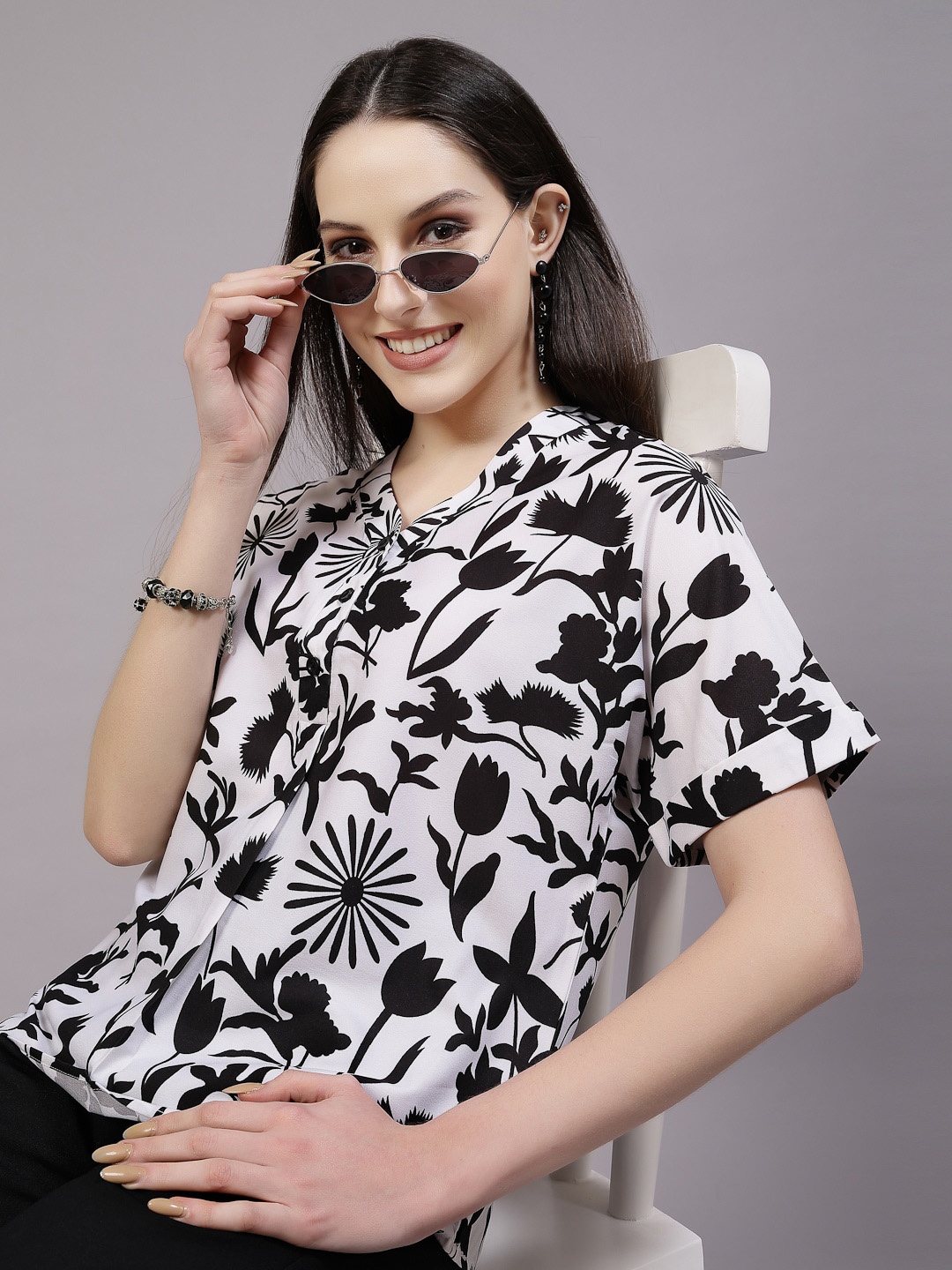 

Style Quotient White & Black Floral Printed Collarless Extended Sleeves Casual Shirt