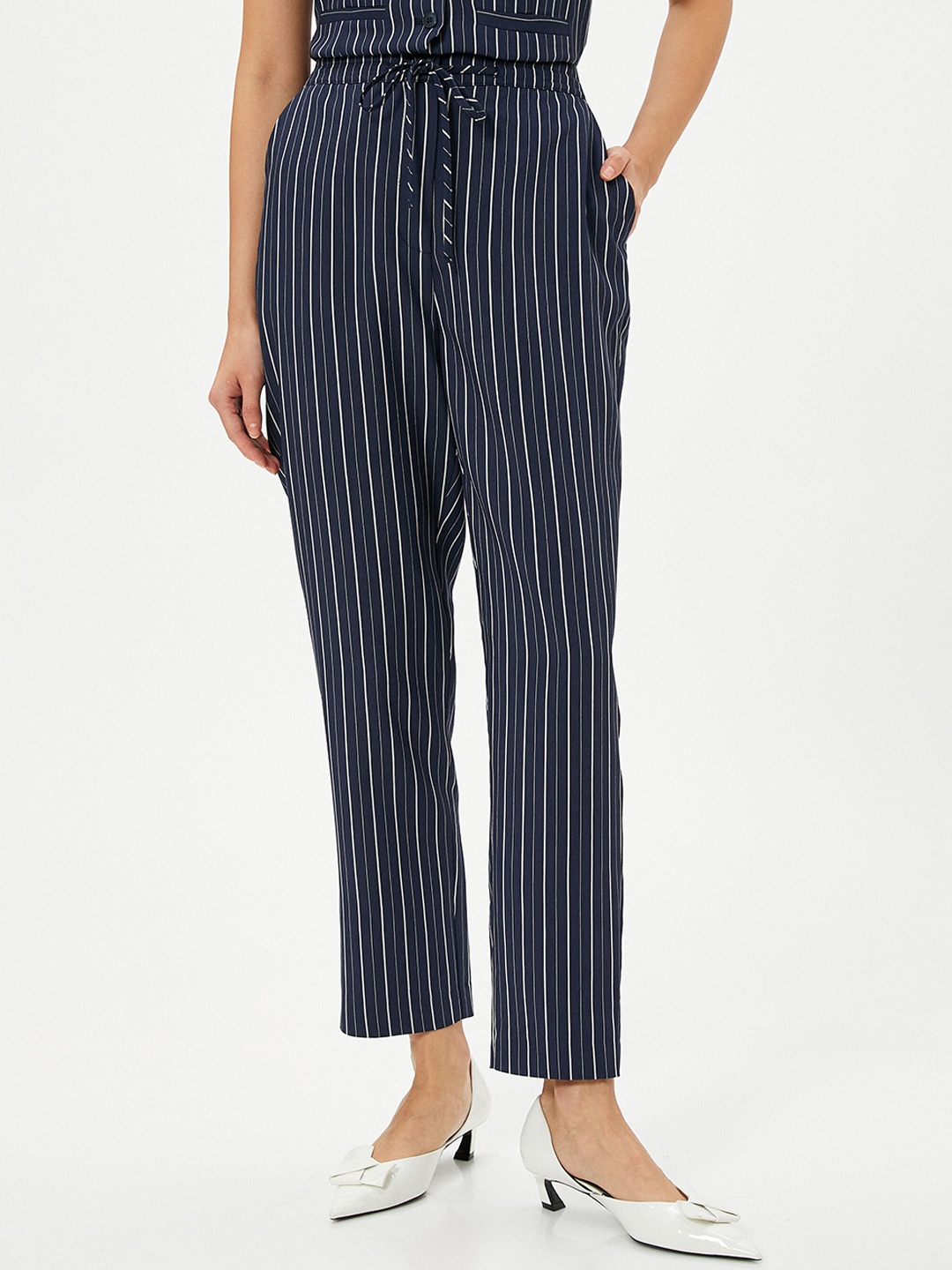 

Koton Women Striped Mid-Rise Cropped Regular Trousers, Navy blue