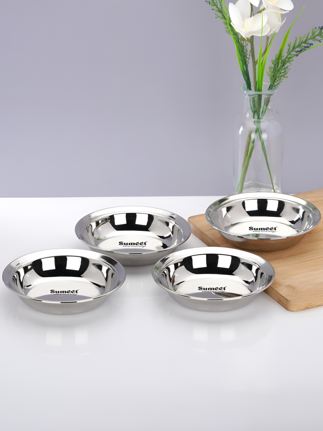 

Sumeet Silver-Toned 4 Pieces Stainless Steel Glossy Plates