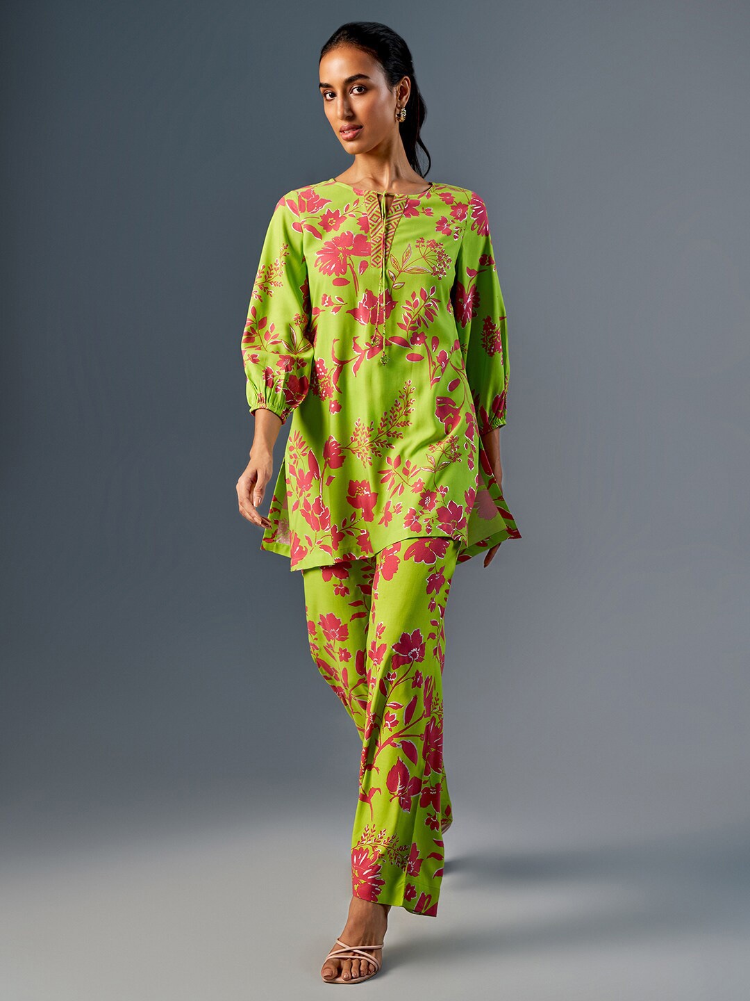 

Global Desi Floral Printed Puff Sleeves Tie Up Neck Tunic, Green