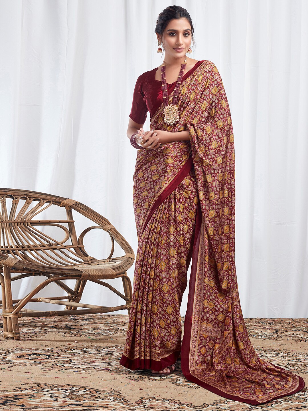 

Satrani Maroon & Yellow Ethnic Motifs Printed Sungudi Saree