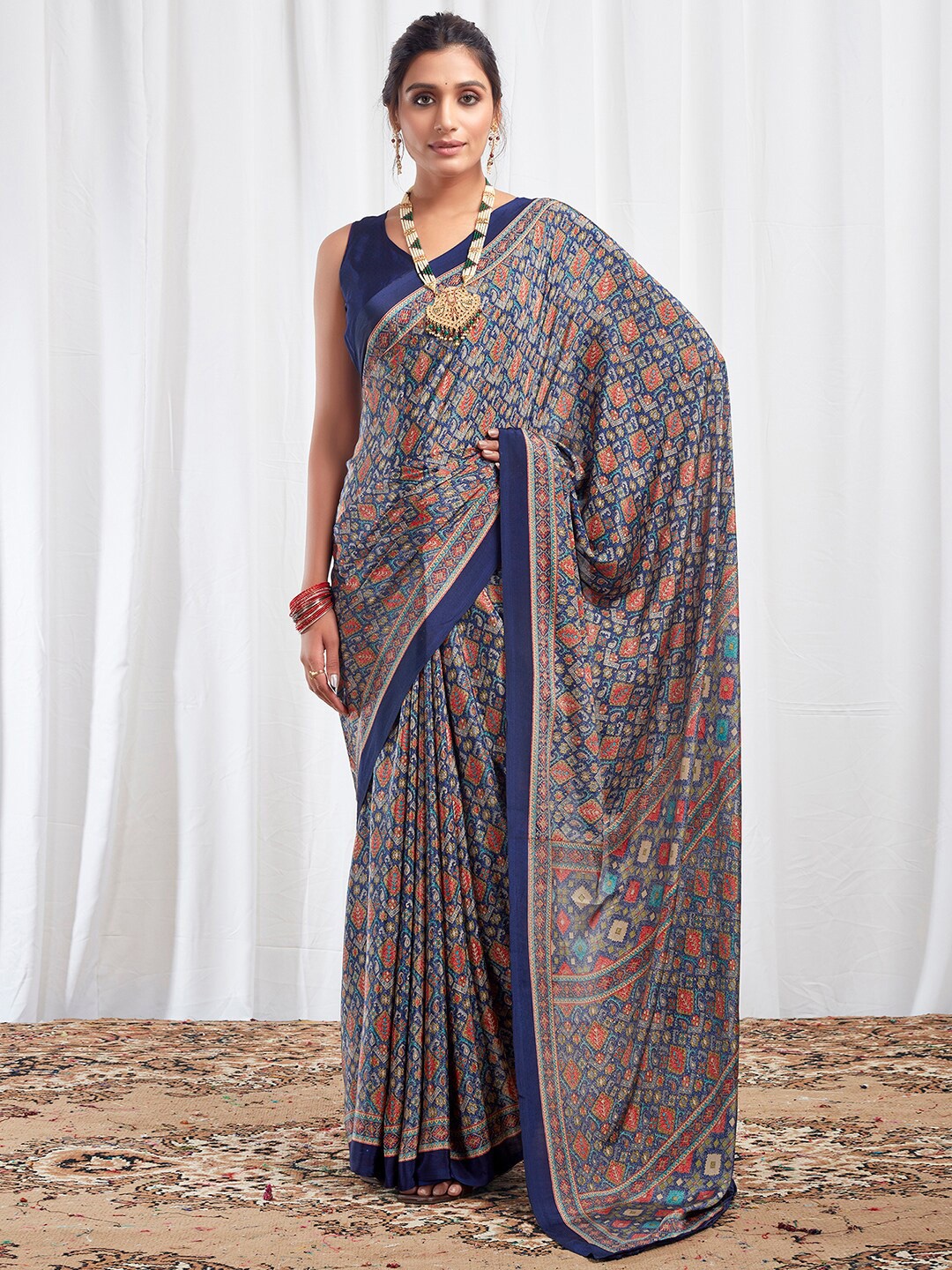 

Satrani Navy Blue & Red Ethnic Motifs Printed Sungudi Saree