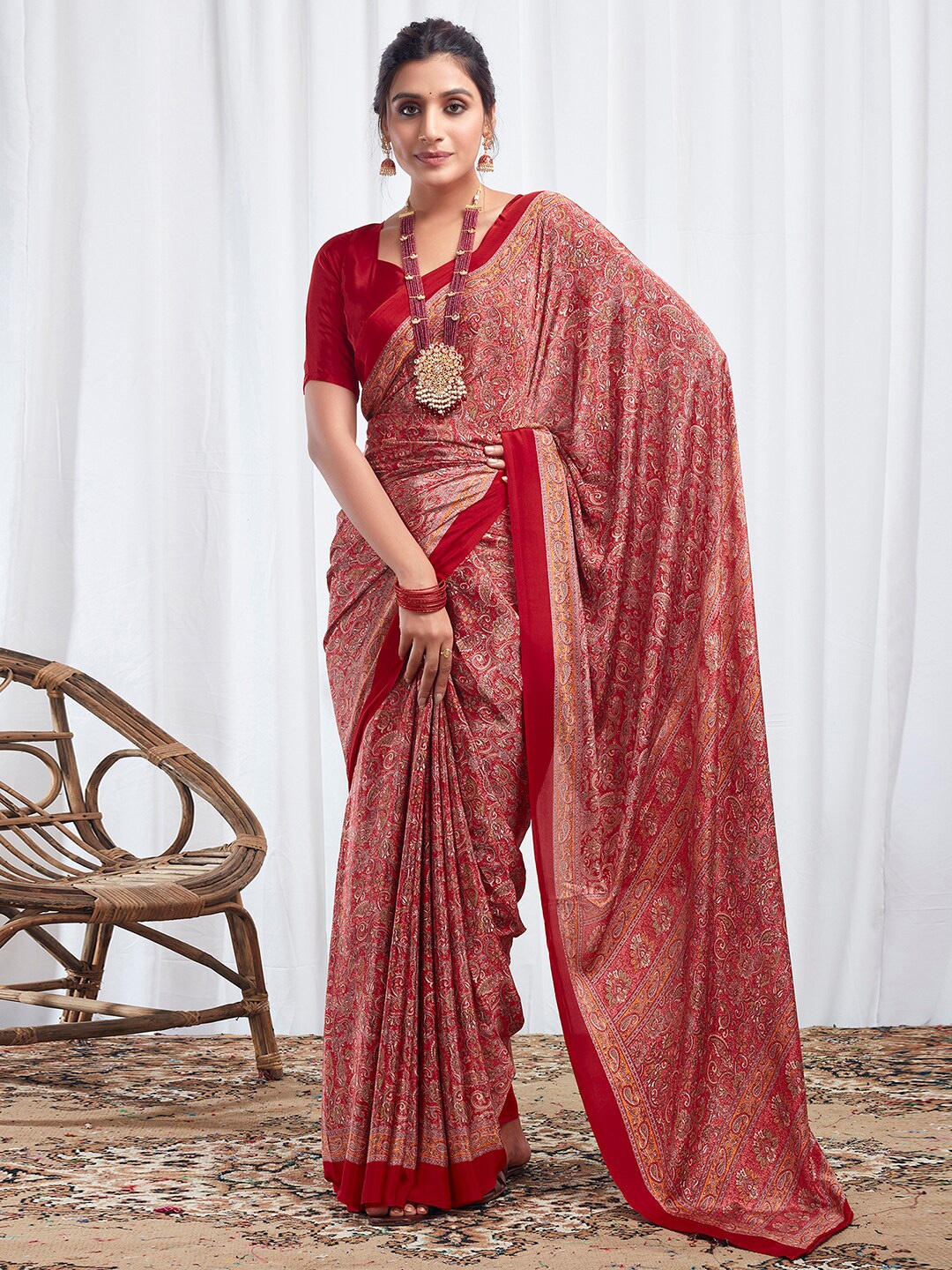 

Satrani Red & White Ethnic Motifs Printed Sungudi Saree