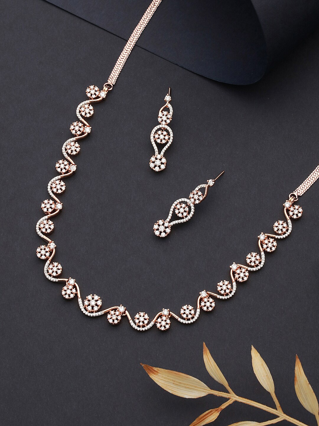 

Saraf RS Jewellery Rose Gold-Plated American Diamond Studded Necklace With Earrings