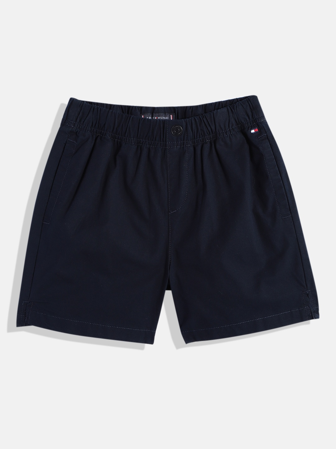 

Tommy Hilfiger Boys Loose Fit Regular Shorts With Mini Side Slits & Button Detail, Navy blue
