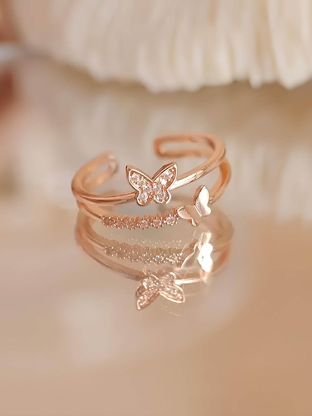 

KARISHMA KREATIONS Set Of 2 Rose Gold-Plated Cubic Zirconia-Studded Adjustable Finger Ring