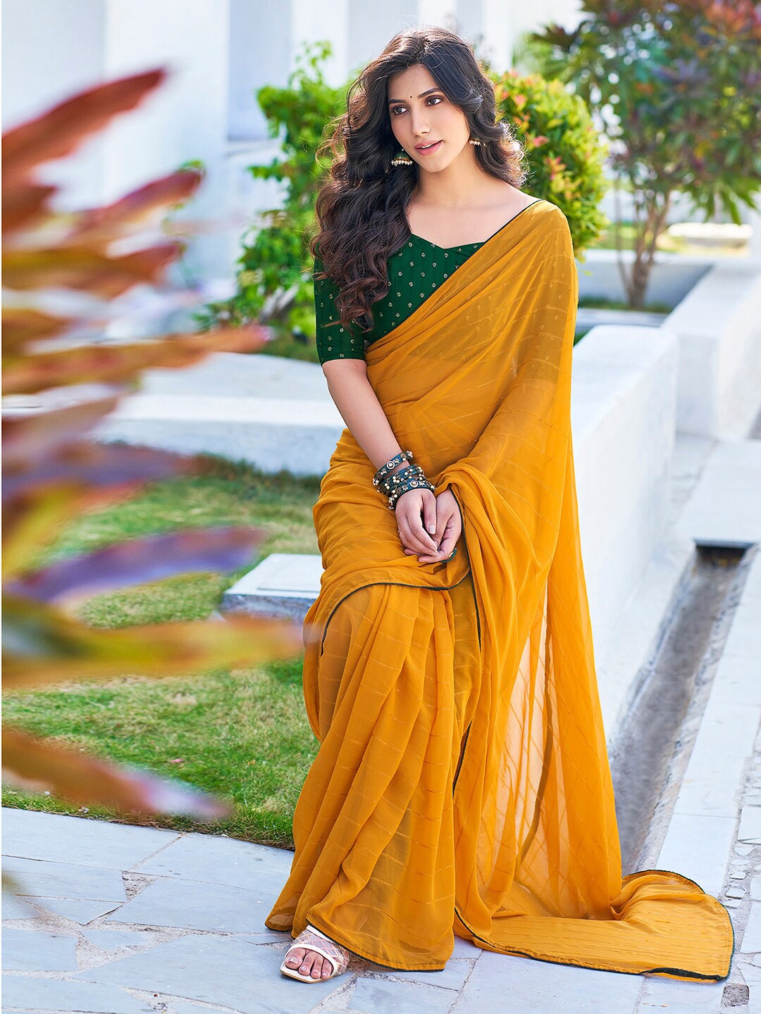 

Satrani Mustard Yellow Striped Printed Saree