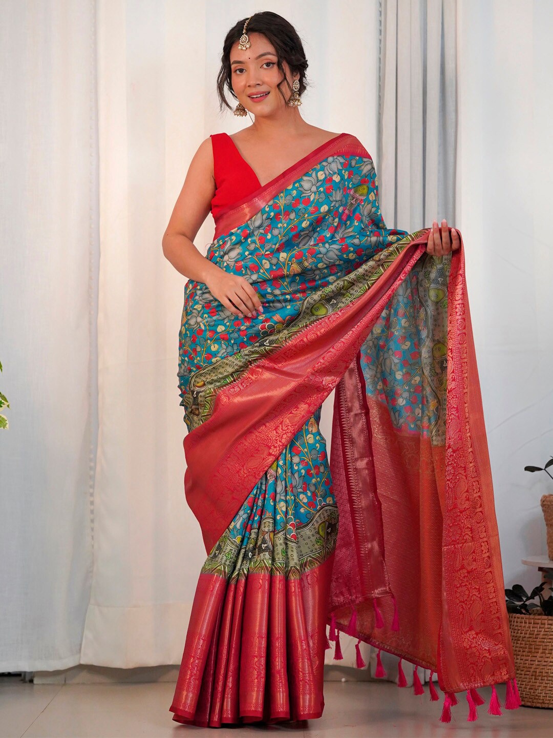

Saree mall Blue Kalamkari Printed Zari Saree With Tessels