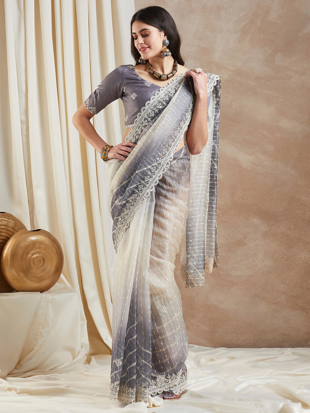 

Saree mall Grey Sequinned Embellished Leheriya Saree