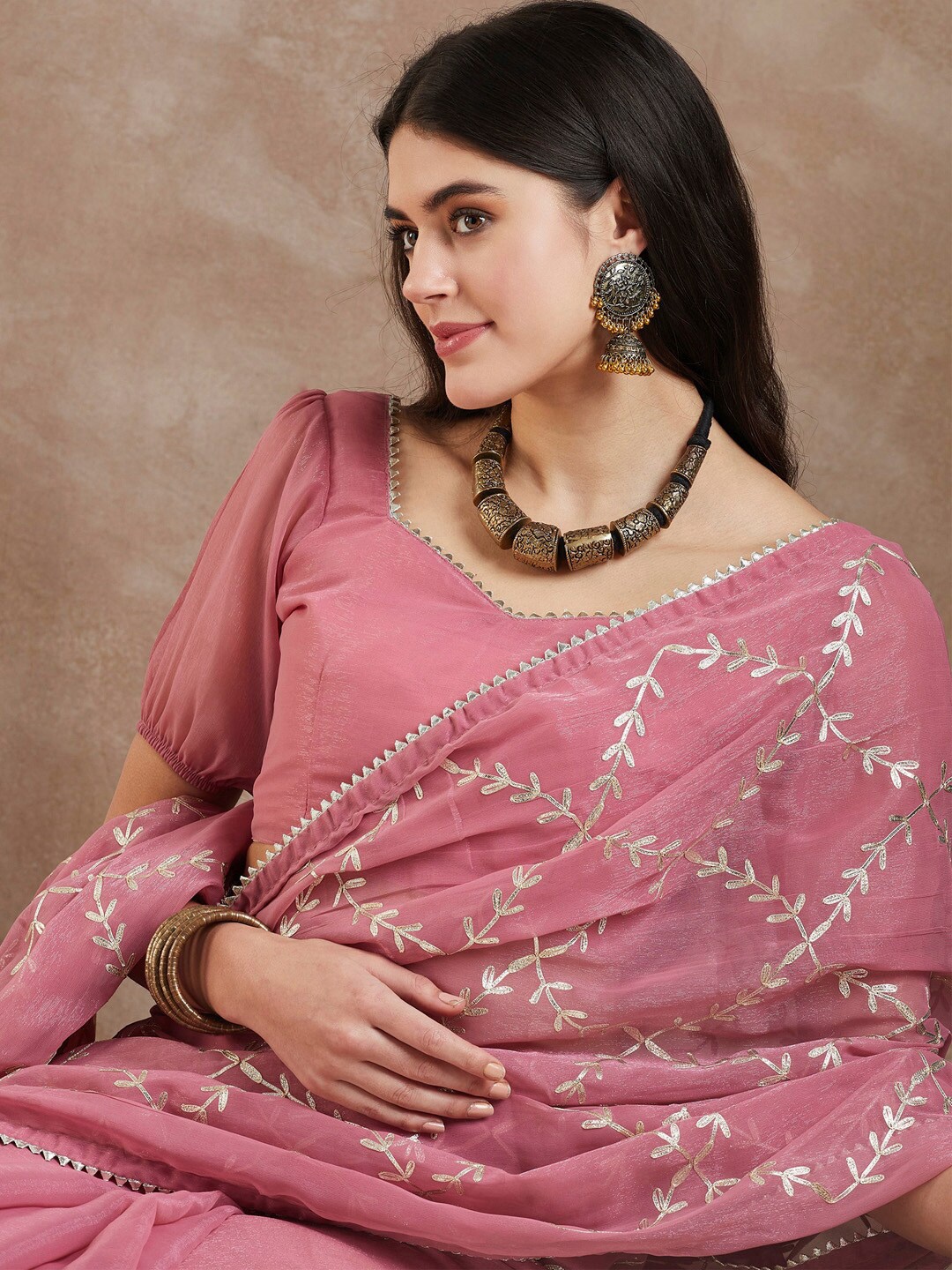 

Saree mall Ethnic Motifs Embroidered Pure Georgette Saree, Mauve