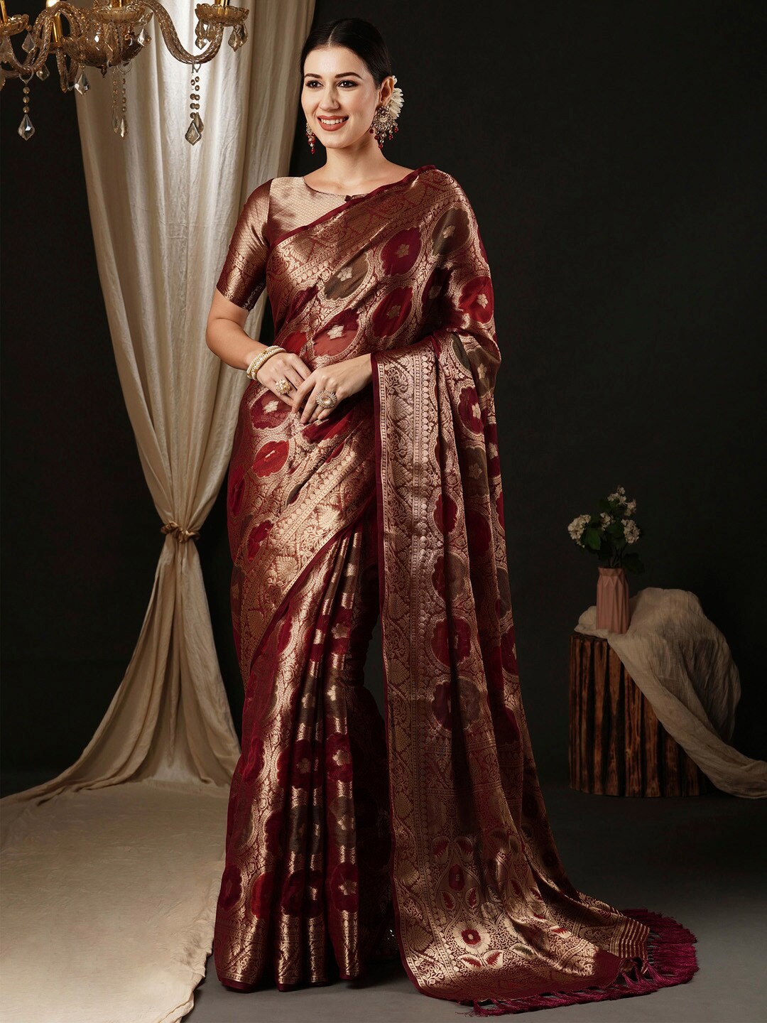 

Anouk Burgundy Ethnic Motifs Woven Design Zari Organza Banarasi Saree