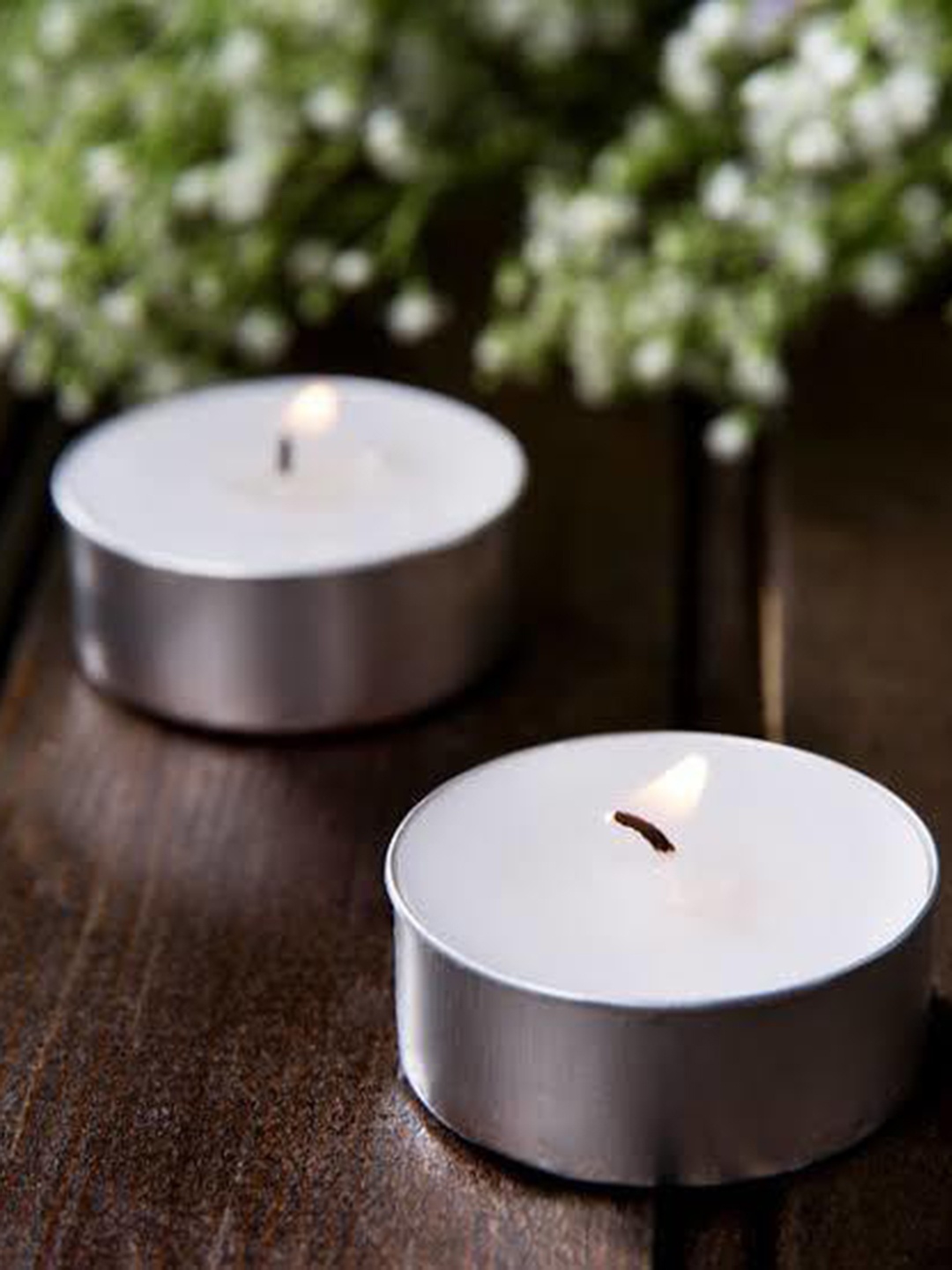 

Sitara Crafts White & Silver Toned 200 Pieces Tea Light Candles