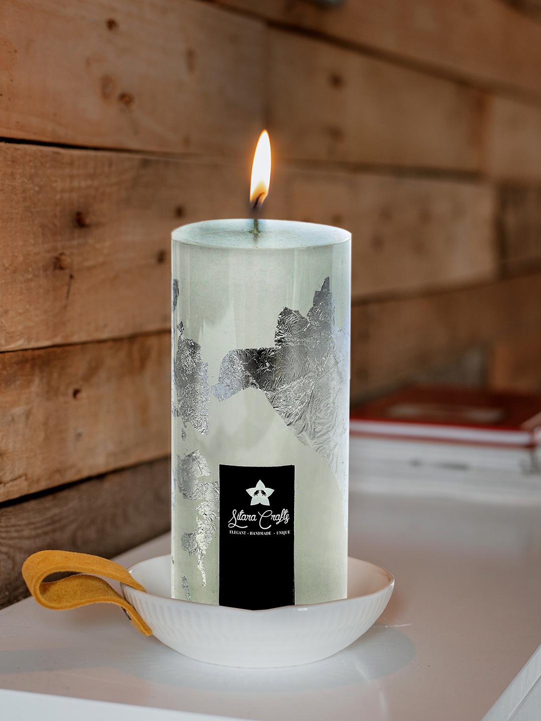 

Sitara Crafts Silver Toned & White Pillar Candle with Silver Foil