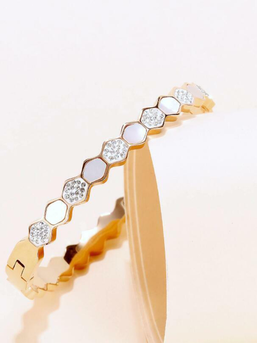 

The Pari Stainless Steel Gold Plated Stones Studded Kada Bracelet
