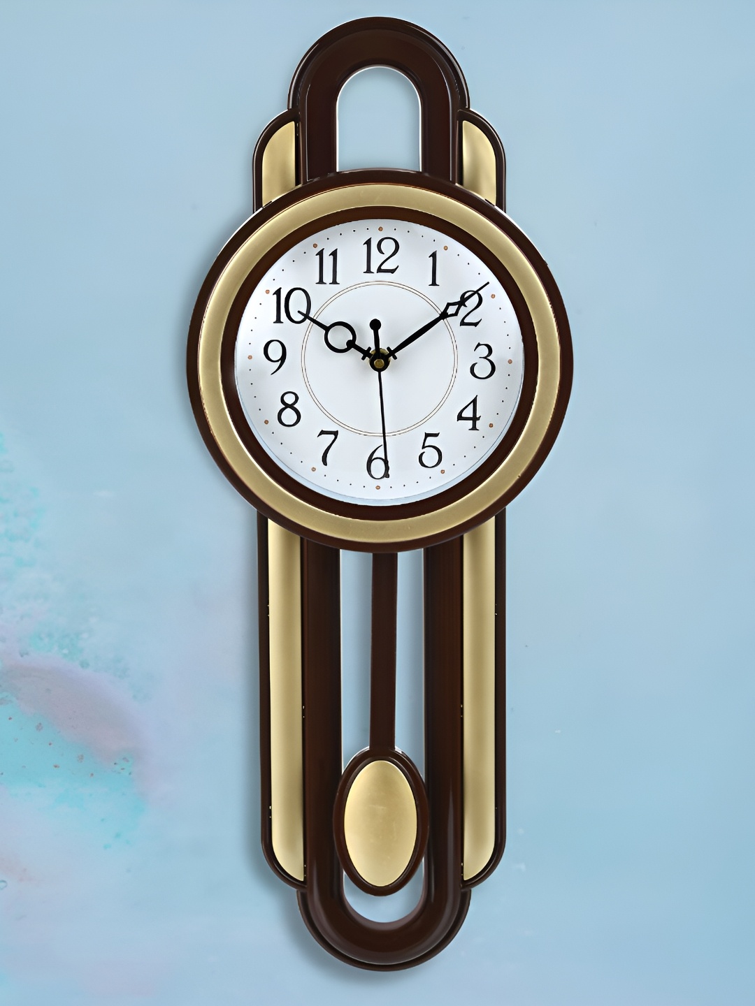

Attractionz Gold-Toned & Brown Round Pendulum Analogue Contemporary Wall Clock