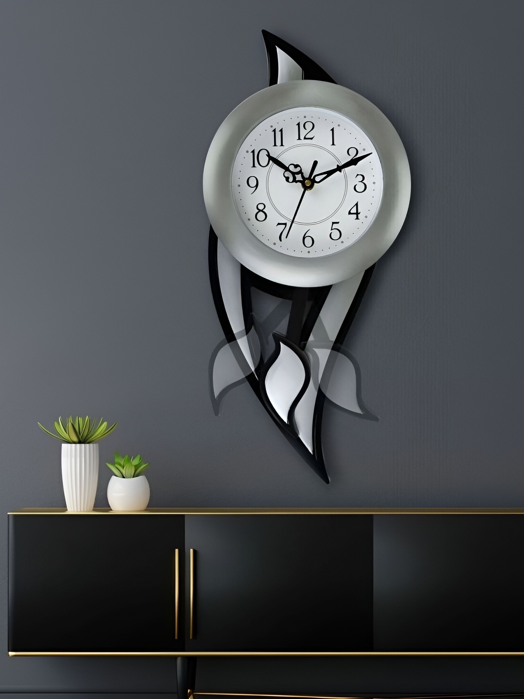 

Attractionz Silver Toned & Black Round Shaped Pendulum Contemporary Analogue Wall Clock