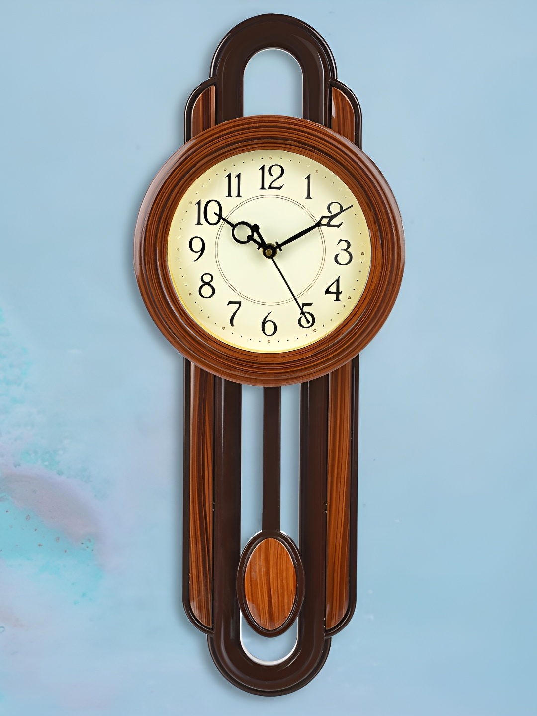 

Attractionz Brown & Black Round Pendulum Analogue Contemporary Wall Clock