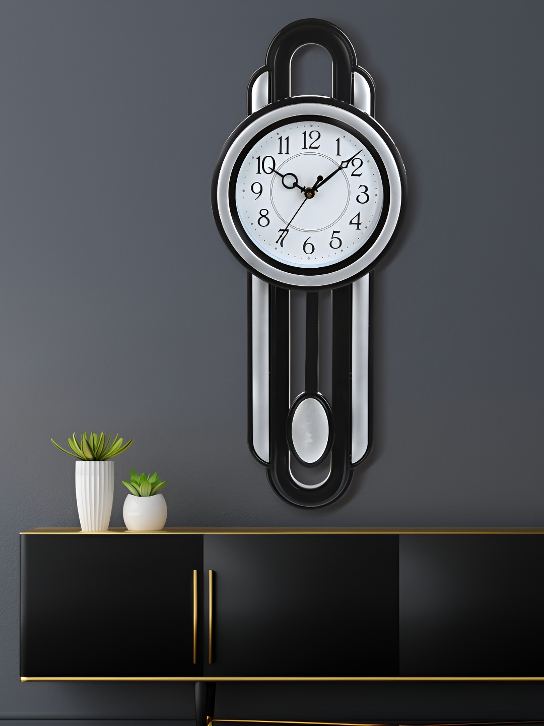 

Attractionz Silver-Toned Round Contemporary Pendulum Wall Clock