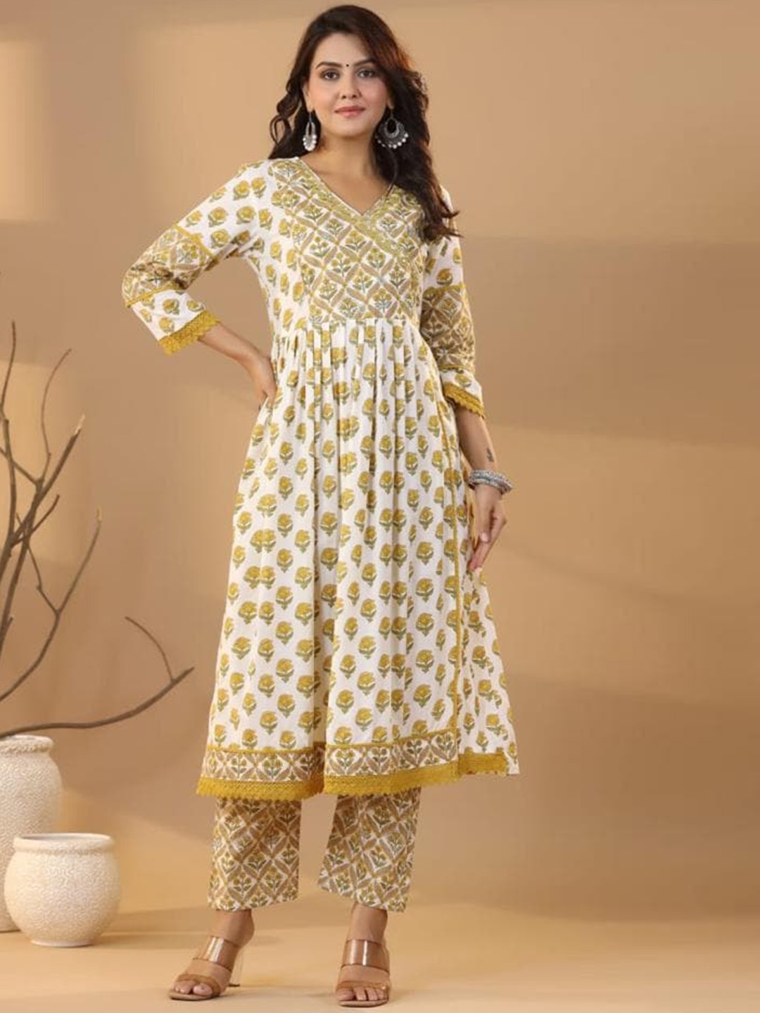 

Advya Floral Printed Regular Sequinned V-Neck Pure Cotton Anarkali Kurta With Trousers, Yellow