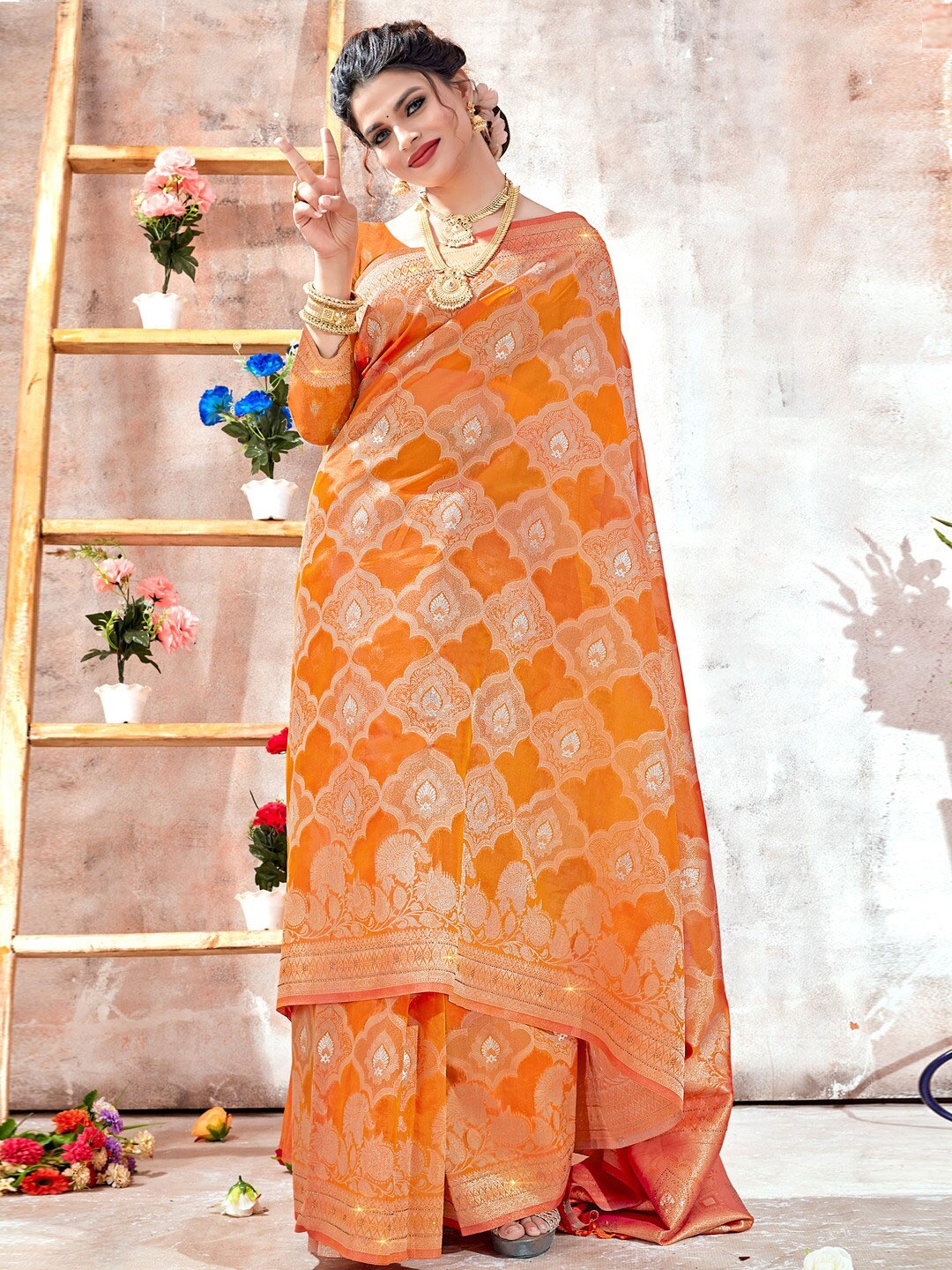 

Mitera Ethnic Motifs Woven Design Zari Organza Saree, Orange