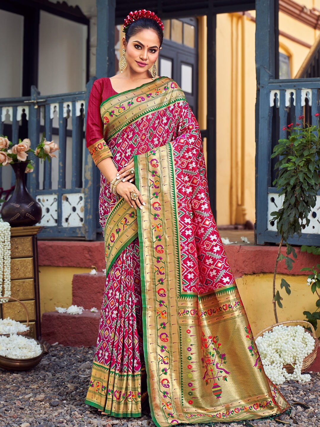 

Mitera Purple Floral Woven Design Zari Patola Saree