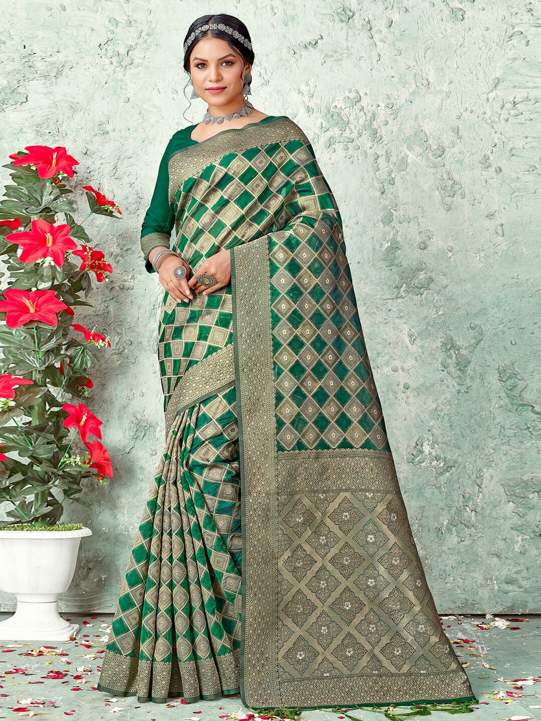 

Mitera Green Geometric Woven Design Zari Organza Saree