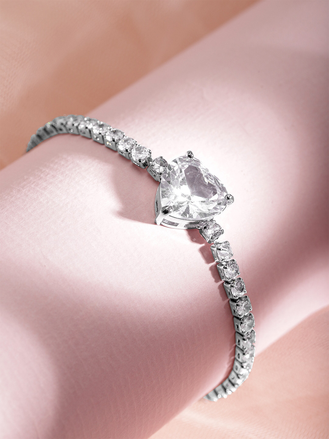 

Rubans Voguish Rhodium-Plated Cubic Zirconia Studded Heart Shaped Link Bracelet, Silver