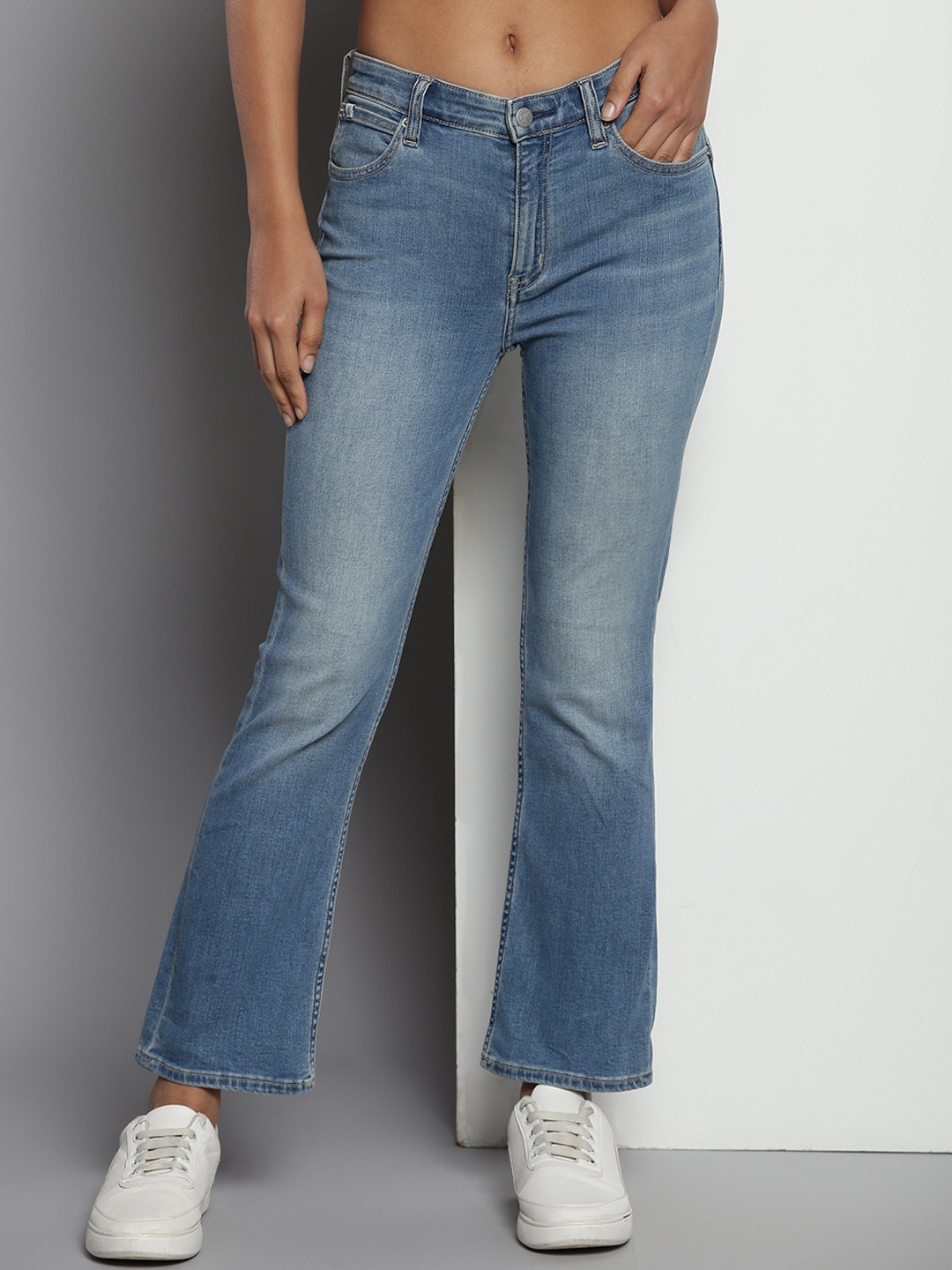 

Calvin Klein Women Bootcut Mid Rise Clean Look Light Fade Jeans, Blue