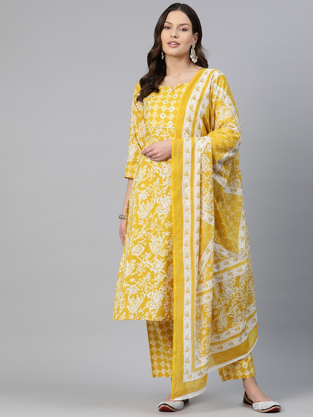 

Readiprint Floral Printed Mirror Work Pure Cotton Kurta Set, Yellow