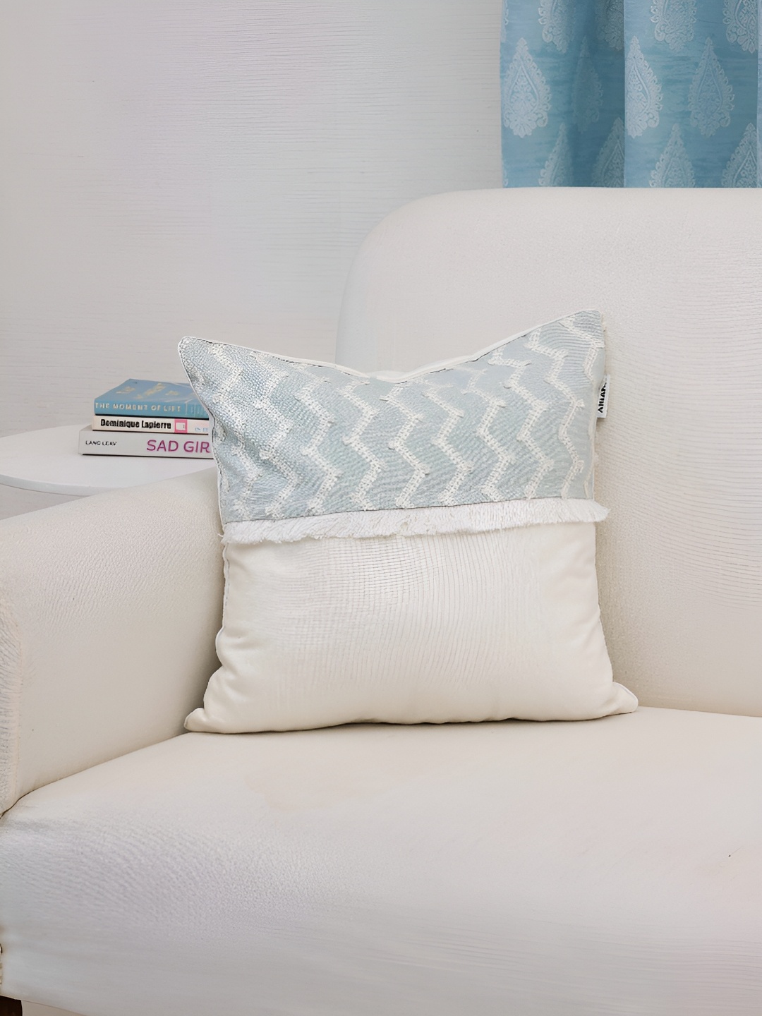 

Ariana White & Blue Ethnic Motifs Square Cushion Covers