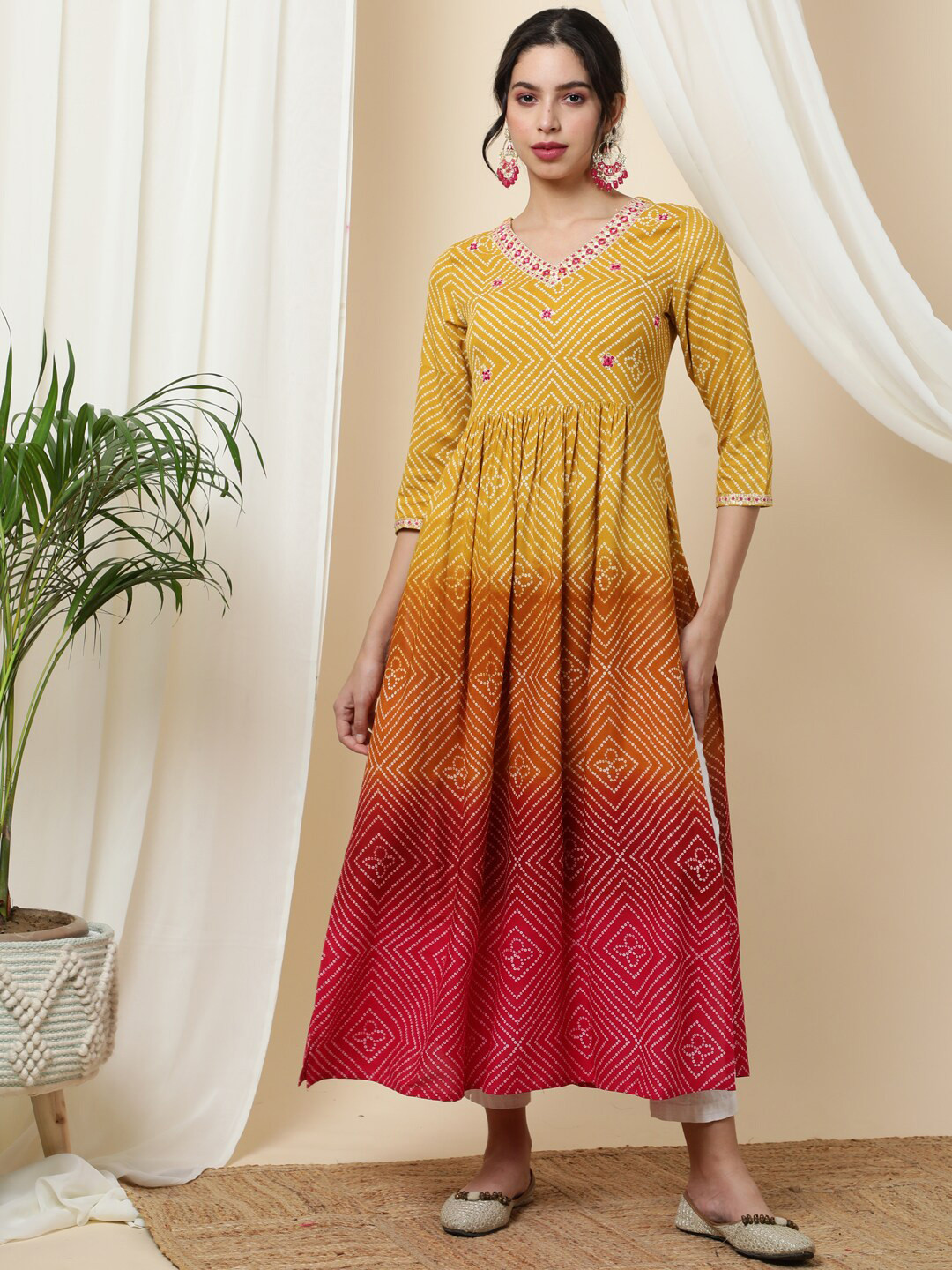 

Chandbaali Bandhani Printed Empire Flared Thread Work Anarkali Kurta, Mustard